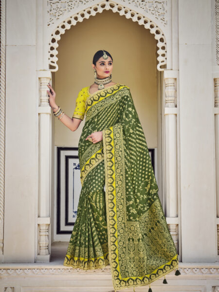 Mehandi green color bandhani silk saree with khadi printed work